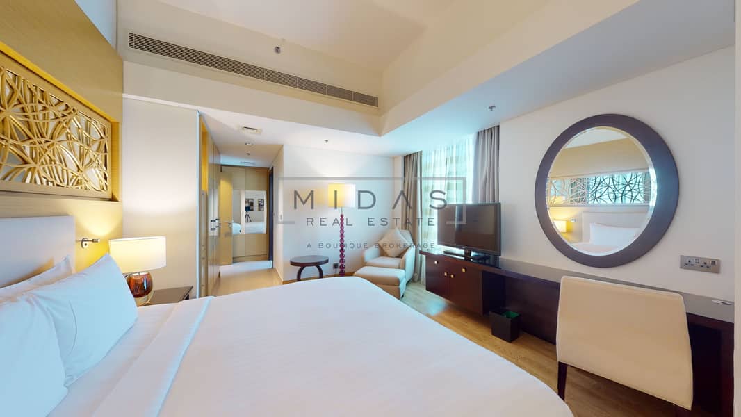 4 MEA AL JADDAF - 2BR _ MASTER BEDROOM _ PHOTO 1. jpg