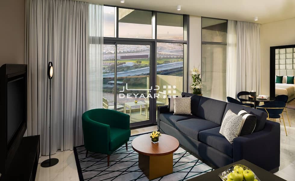 4 MABB - Premium 1 Bedroom Apt. Living Room daytime. jpg