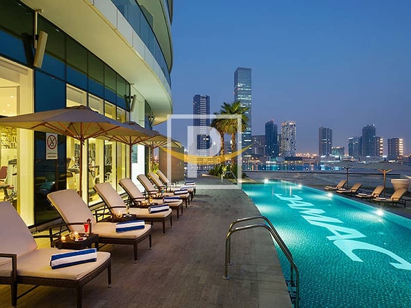 位于商业湾，达马克海湾之畔大厦 1 卧室的公寓 1600000 AED - 12307315