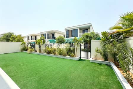 4 Bedroom Villa for Rent in Tilal Al Ghaf, Dubai - Landscaped | Vacant - Green Belt