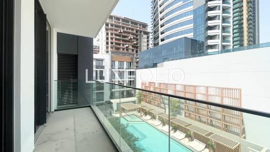 1 Bedroom Apartment for Rent in Jumeirah Village Circle (JVC), Dubai - Pool View | High Floor | Brand New