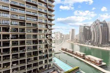1 Bedroom Apartment for Rent in Business Bay, Dubai - 19f56a22a4ae44f2a54541728d4a3424. jpg