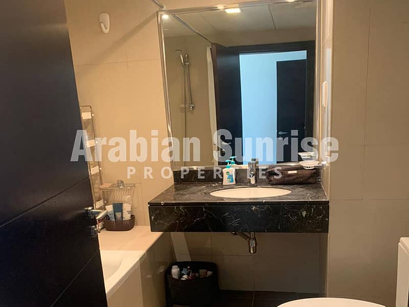 8 Sun_Tower_1BR_1803_Bathroom. jpg