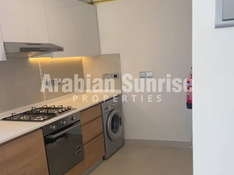 8 Radiant-Boulevard-2BR-702-Kitchen-1. jpg