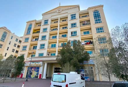 فلیٹ 2 غرفة نوم للبيع في المدينة العالمية، دبي - building1. jpg