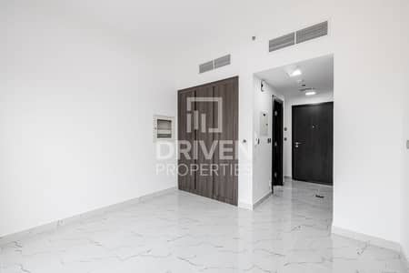 Studio for Rent in Dubai Land Residence Complex, Dubai - Brand New | High Floor | Ready to Move In