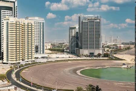 Studio for Sale in Dubai Sports City, Dubai - Fully Furnished | Canal View | Mid Floor