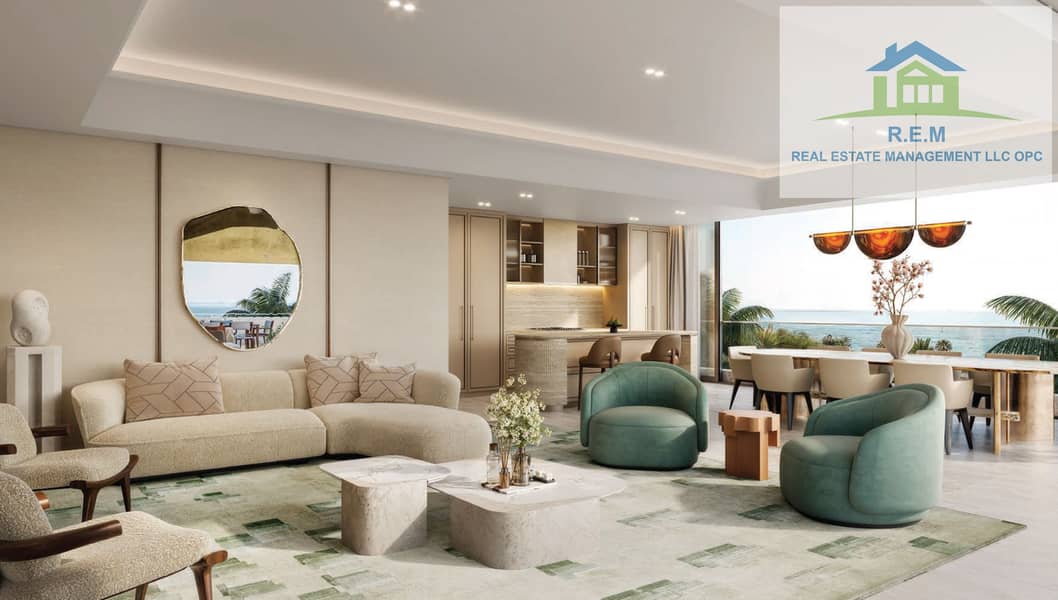 10 3BR_Apt_Living Room & Kitchen - Fairmont Residences Al Marjan Island. jpg