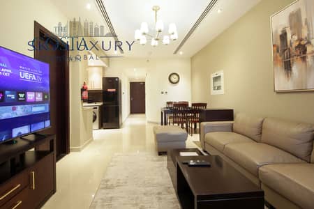 فلیٹ 1 غرفة نوم للايجار في وسط مدينة دبي، دبي - A LIVINGROOM (2). jpg