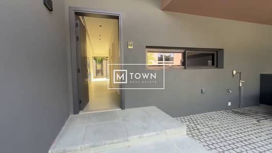 2 Bedroom Townhouse for Sale in Tilal City, Sharjah - front door1. png
