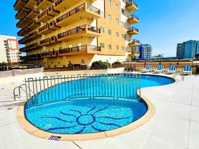 Studio for Rent in International City, Dubai - Chic Studio | Pool-Facing | Vibrant Community Living