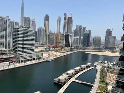 1 Bedroom Apartment for Rent in Business Bay, Dubai - Full Canal and Burj Khalifa View | Vacant
