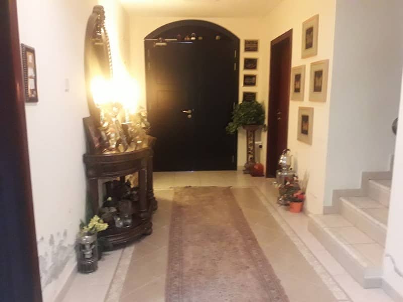 nice and big fully furnished 2br with maid\'s room Villa for sale in al maqta compound with private parking, parking garden, central ac, central gas