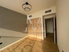 Modern One-Bedroom Loft Corner Unit with Front Parking