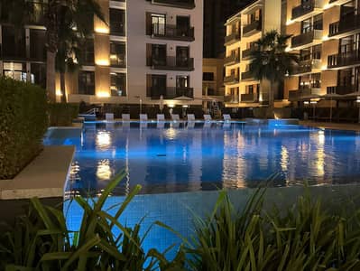 فلیٹ 2 غرفة نوم للايجار في قرية جميرا الدائرية، دبي - Pool. jpg