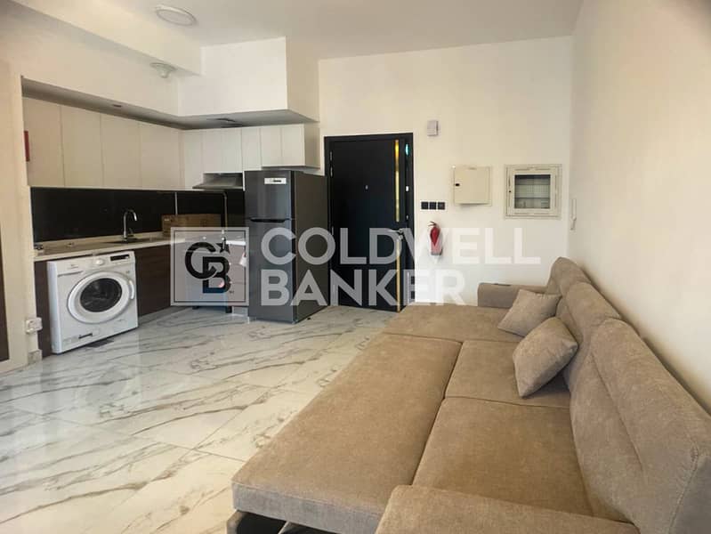 位于国际城，奥利夫兹公寓 的公寓 610000 AED - 12428819