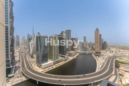 1 Bedroom Flat for Rent in Business Bay, Dubai - Biggest Layout | Corner Unit | Canal and Burj View