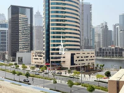1 Bedroom Flat for Rent in Business Bay, Dubai - Partial Canal View | Unfurnished | Big Terrace