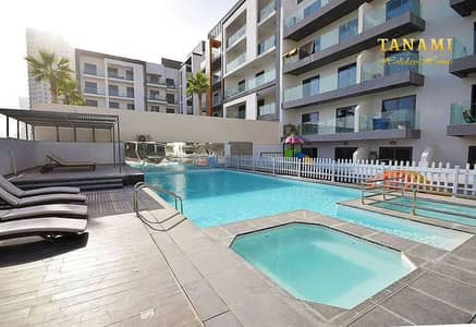 Studio for Rent in Jumeirah Village Circle (JVC), Dubai - Pool in Alcove. jpg