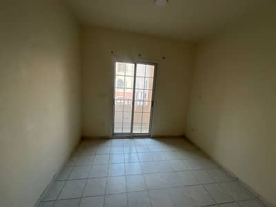 فلیٹ 1 غرفة نوم للايجار في المدينة العالمية، دبي - 08516b5c186748c39f27cfa3b6c3b322-. jpg