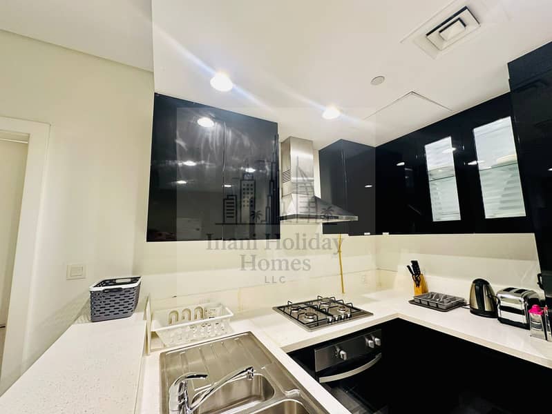 Elegant 1BR With all Bills| Close to Dubai Mall - Image 16