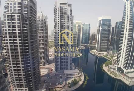 朱美拉湖塔 (JLT)， 迪拜 1 卧室单位待租 - 位于朱美拉湖塔 (JLT)，JLT R区，马格214塔 1 卧室的公寓 85000 AED - 12448799
