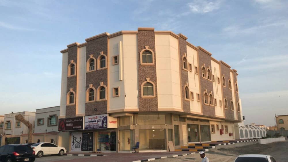 For sale in Ajman with excellent income angle two streets