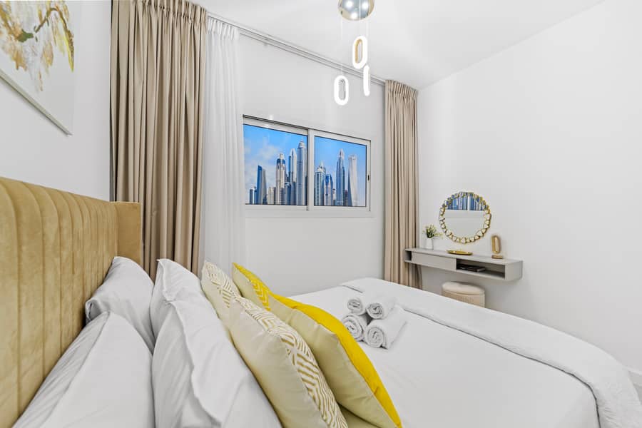 Stylish 2BR with Pool, Gym and Skyline View - Image 11