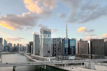 1 Bedroom Flat for Sale in Business Bay, Dubai - Best Canal View | Upgraded + Renovated | Furnished