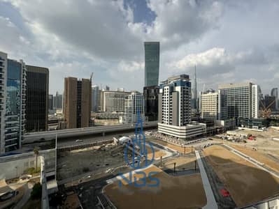 فلیٹ 1 غرفة نوم للبيع في الخليج التجاري، دبي - dcbe5535-0ed4-4067-b668-28623d4cd484. jpg