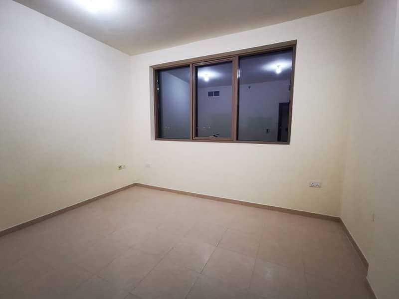 OUTCLASS 2 BEDROOM HALL WITH BASEMENT PARKING AND WARDROBES AT MUSSAFAH SHABIA