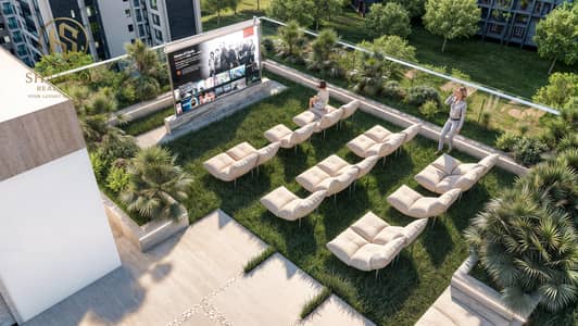 1 Bedroom Apartment for Sale in Jumeirah Village Circle (JVC), Dubai - Cinema - 105 Residences by Kamdar . jpg