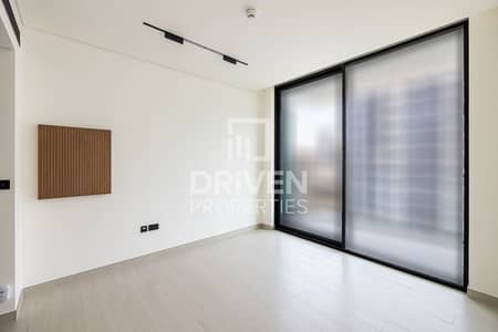 Studio for Sale in Jumeirah Village Circle (JVC), Dubai - Largest Layout | Elevated Unit with Pool View