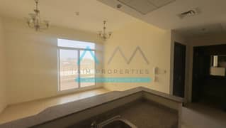 Spacious 1-Bedroom Apartment with Open Views on a High Floor – Available for Sale at 595,000 AED.