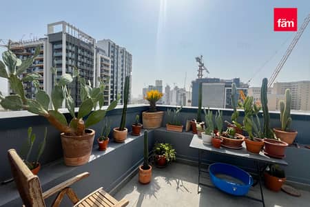 2 Bedroom Apartment for Sale in Jumeirah Village Circle (JVC), Dubai - Elegant 2BR | Study and Terrace | Motivated Seller