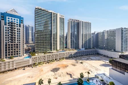 2 Bedroom Apartment for Sale in Business Bay, Dubai - Swimming Pool View | Vacant | Fully Furnished