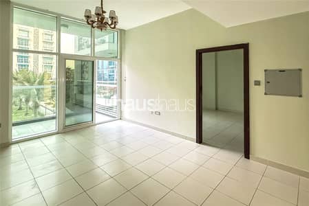 1 Bedroom Flat for Rent in Dubai Studio City, Dubai - Garden View | Spacious and Bright | Location