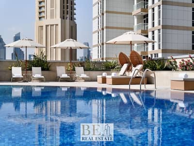 1 Bedroom Apartment for Rent in Downtown Dubai, Dubai - Outdoor Pool-2. JPG