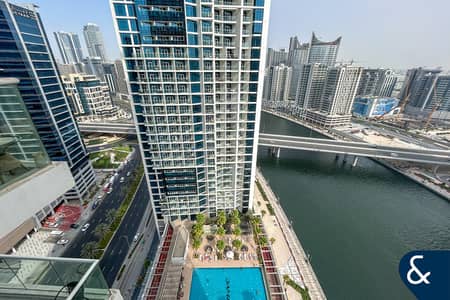 Studio for Rent in Business Bay, Dubai - Full Pool & Canal View | Large Layout | Ready