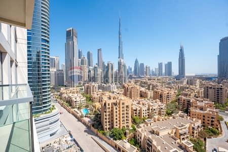 شقة 2 غرفة نوم للايجار في وسط مدينة دبي، دبي - شقة في برج بلفيو 1،أبراج بلفيو،وسط مدينة دبي 2 غرف 170000 درهم - 12529078