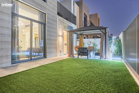 4 Bedroom Townhouse for Rent in Arabian Ranches 3, Dubai - Backyard Sreating Area 5. jpg