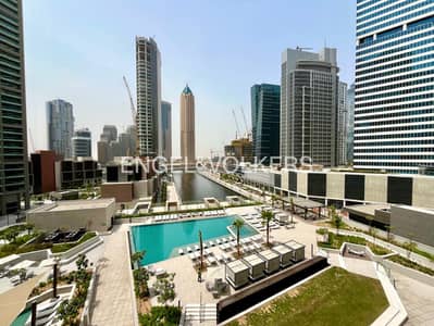 Studio for Rent in Business Bay, Dubai - Pool and Canal View | Brand New | Unfurnished