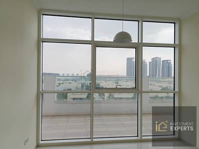 1 Bedroom Flat for Rent in DAMAC Hills, Dubai - Unfurnished 1-Bedroom Apartment for Rent in Carson Tower, DAMAC Hills