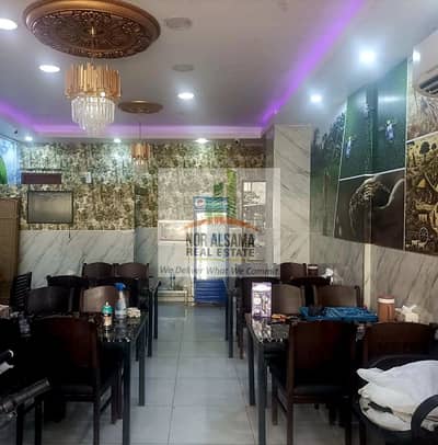 محل تجاري  للايجار في المدينة العالمية، دبي - 1000691620. jpg