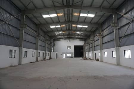 مستودع  للبيع في مدينة الإمارات الصناعية، الشارقة - Industrial property dealer _ Best Warehouse for rent in Vapi (1). jpeg