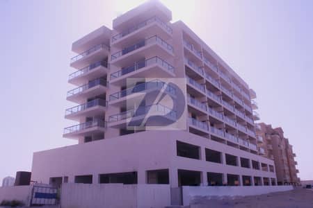 1 Bedroom Apartment for Sale in International City, Dubai - Tower building. png
