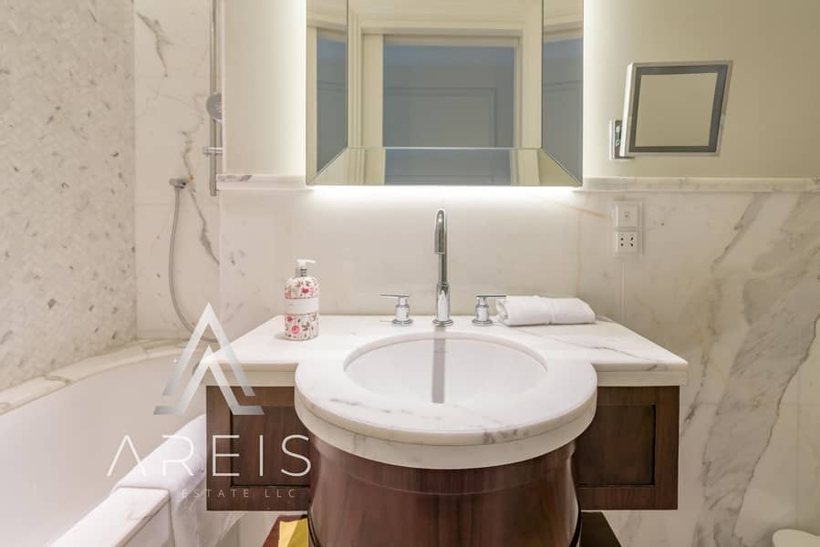 High-Floor 4BR in Address BLVD Downtown - Image 26