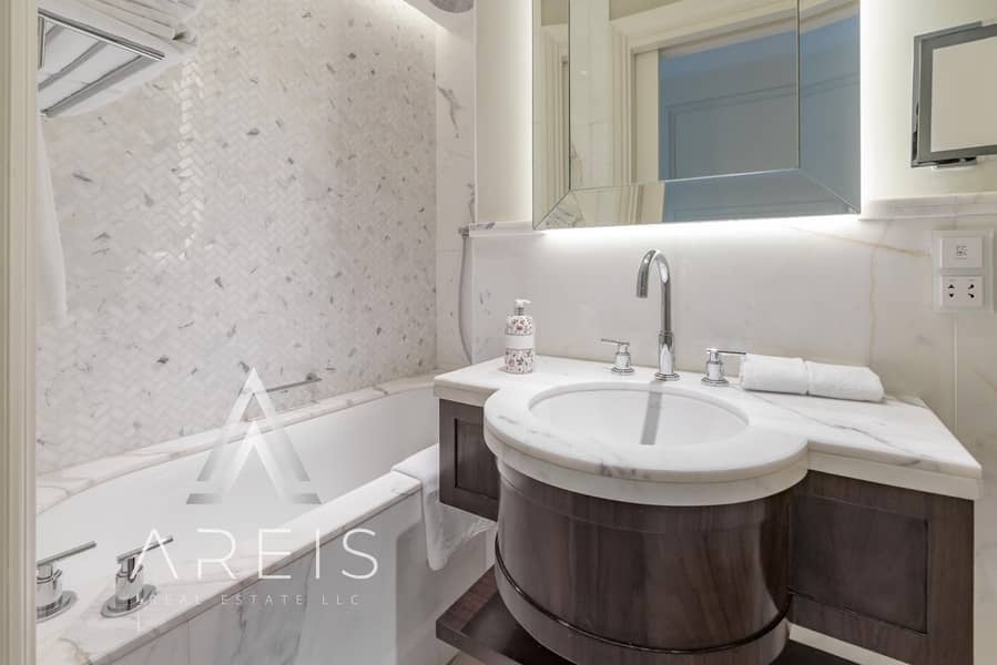 High-Floor 4BR in Address BLVD Downtown - Image 40