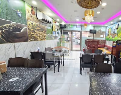 محل تجاري  للايجار في المدينة العالمية، دبي - 1000696168. jpg