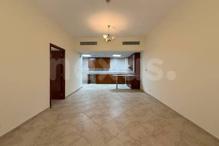 1 Bedroom Flat for Rent in Motor City, Dubai - Expansive layout | Serene setting | Park view